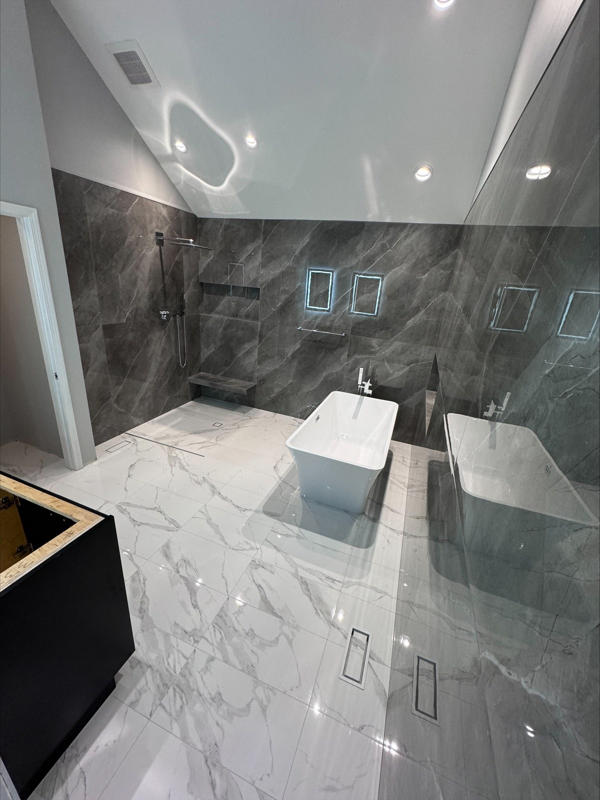 Completed bathroom renovation by JC Custom Tile
